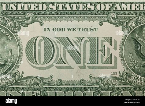 One Dollar Bill With Focus On The One On Back And In God We Trust Stock