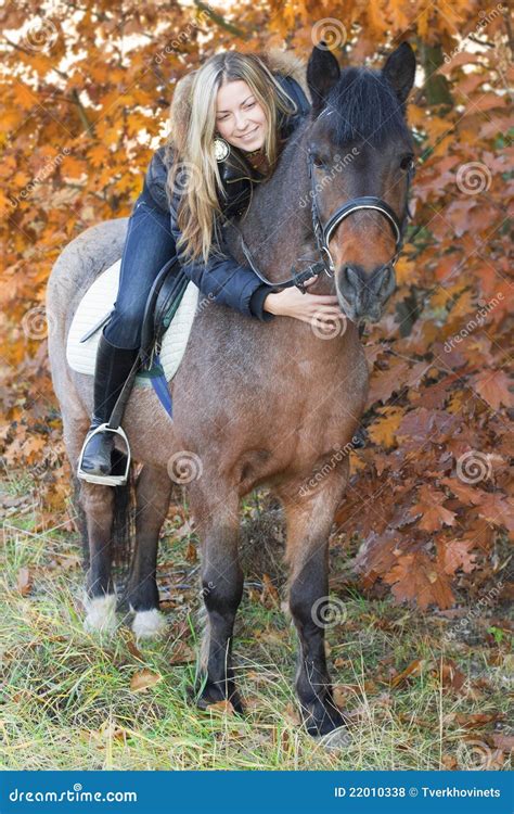 Young Girl On Horseback Stroking A Horse Stock Photo Image Of Country
