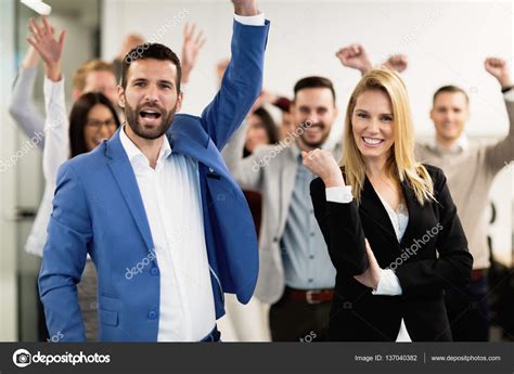 Happy business people celebrating success — Stock Photo © nd3000 #137040382