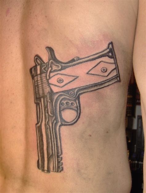 Amazing Gun Tattoo Designs