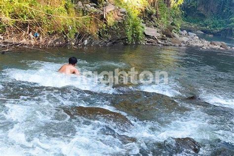 Sebidang Lahan Los Tebing Sungai Besar Bebatuan BerLokasi Di Desa