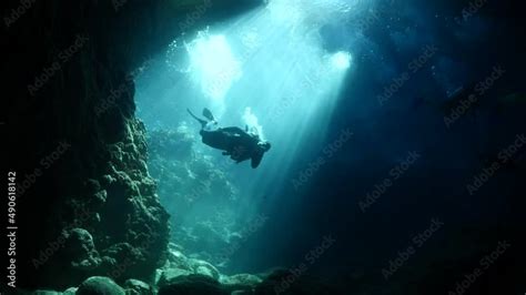 Cave Diving Underwater Scuba Divers Exploring Caves And Having Fun
