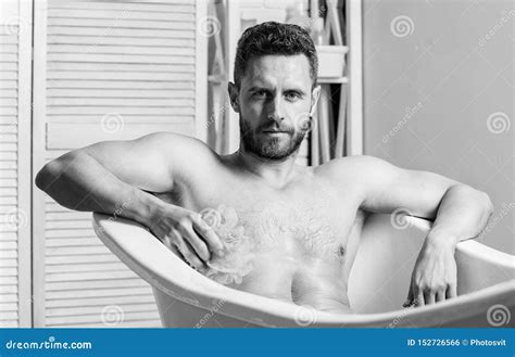Man Muscular Torso Sit In Bathtub Skin Care Hygienic Procedure