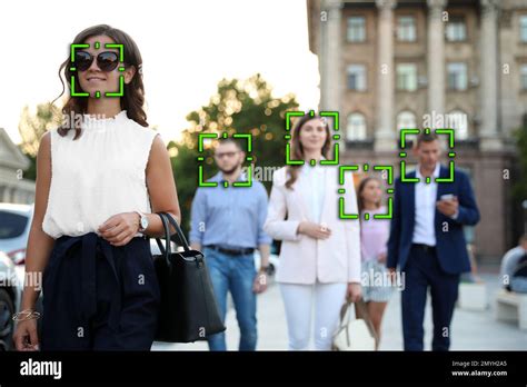 Facial Recognition System Identifying People On City Street Stock Photo