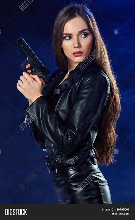 Beautiful Sexy Girl Holding Gun Image Photo Bigstock 25376 Hot Sex
