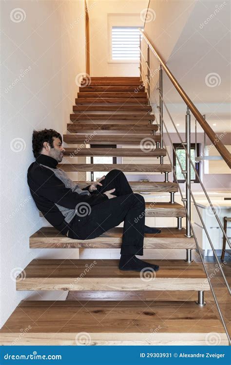 Interior Man Sitting On The Stairs Stock Image Image Of Home