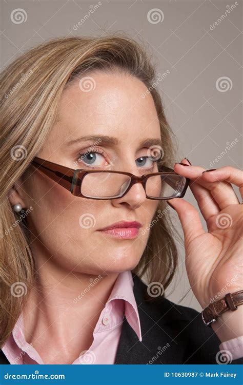 Woman Looking Over Glasses Stock Image Image Of Business 10630987