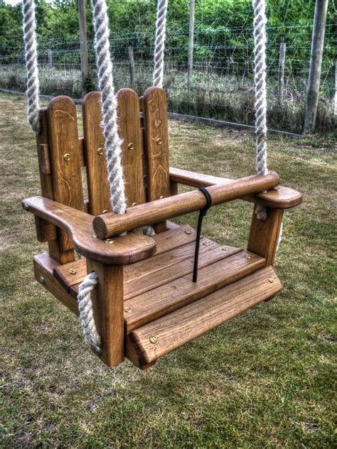 See more pictures and free plans. Swings | Baby swing outdoor, Wooden swings, Wooden baby swing
