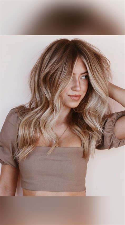 flaunt your youthful and feminine vibes with this long textured golden blonde hair created by
