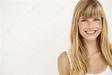 Young Woman Smiling Stock Photo By ©sanneberg 87955518