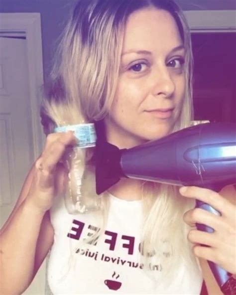 Videos Of People Using Their Blow Dryers And Empty Water Bottles To Curl Their Hair Are Going