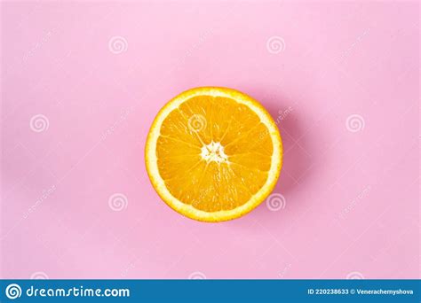 Top View Of One Orange Round Fruit On Bright Blue Background Rich