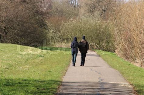 Couple Man And Wife Are Walking In Stock Image Colourbox