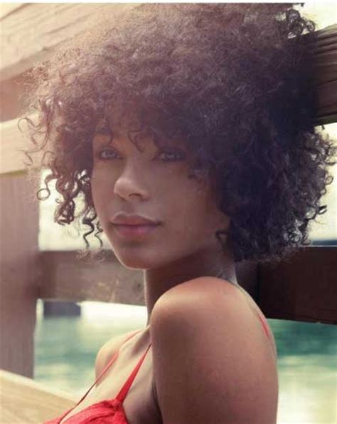 It is still a short afro hairstyle, but the top is actually longer than the back part, with curls sticking similar to the hairstyle above, but this particular shot afro haircut focuses completely on the top part. Short Hair Cuts for Curly Hair | Short Hairstyles 2017 ...