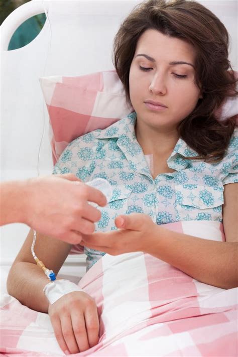 Nurse Helps Girl In The Treatment Stock Photo Image Of Tired Nurse