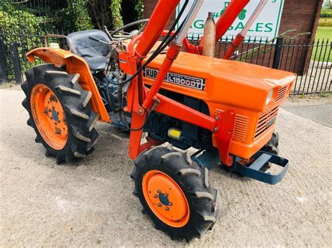 Kubota L1500dt 4wd Compact Tractor Cw Front Loader And Bucket
