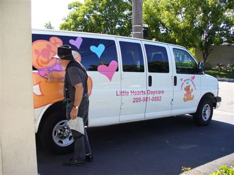 One Of Our Dearly Missed Employees Working On A Van For A Local Daycare