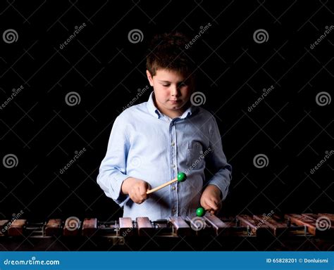 Boy Playing On Xylophone Stock Image Image Of Black 65828201