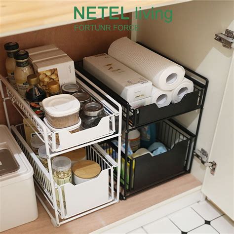 She says, since we have a really small kitchen we have to find storage for everything even some extra countertop. NETEL Sliding Cabinet Basket Pull Out Kitchen Organizer ...