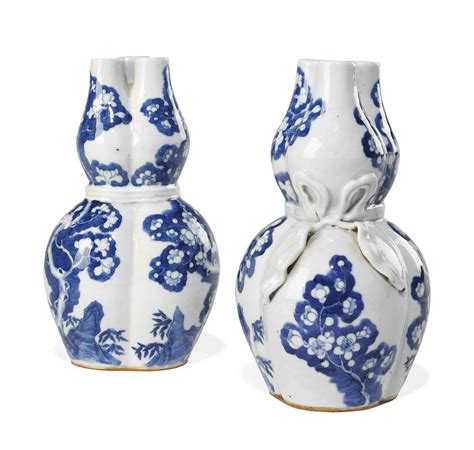 A Pair Of Chinese Blue And White Triple Necked Double Gourd Vases