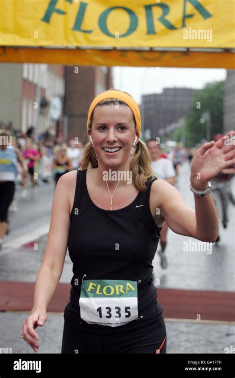Tv3s Laura Ryan Waves To Some Friends As She Crosses The Finish Line