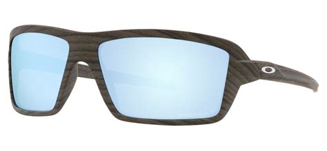 Oakley Cables Sunglasses Woodgrain Prizm Deep Water Polarised Tortoise Black