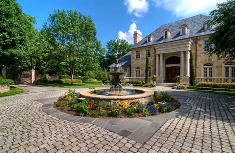 Suburban house with light powerboat parked on driveway in front of the house. 19 Brilliant Tiered Fountain Design To Enhance The Look Of ...