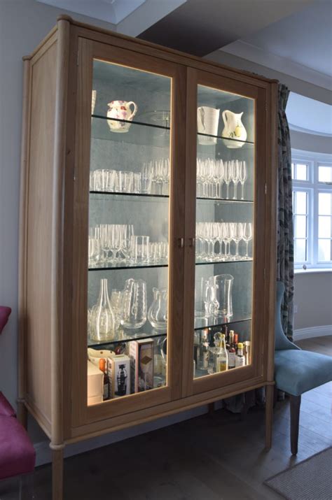 Your kitchen cabinet glass can be as decorative as you would like it to be. Glass Display Cabinet: Exceptional Design for a Living ...