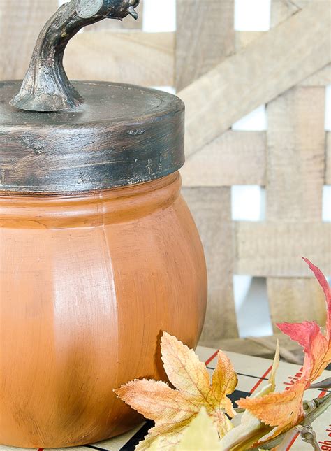 Pumpkins made from Dollar Tree Storage Jars | Little House of Four