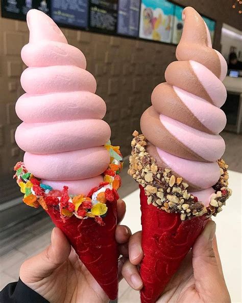 Two Ice Cream Cones With Sprinkles On Top