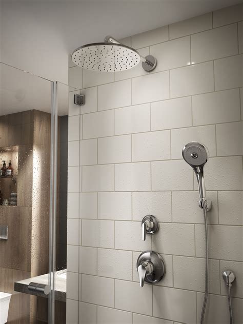 Toto Rain Shower And Hand Shower Sets Paired With Neutral Tile Create A Refreshing Space To