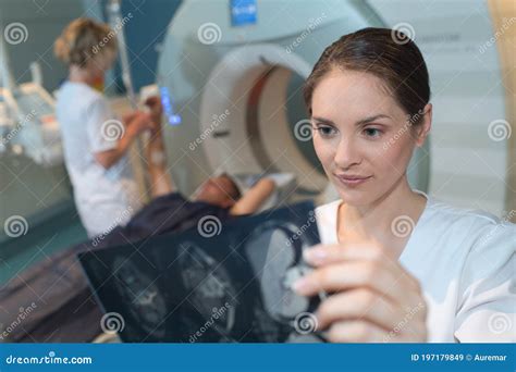 Medical Worker Examining Mri Scan Results Stock Image Image Of Film