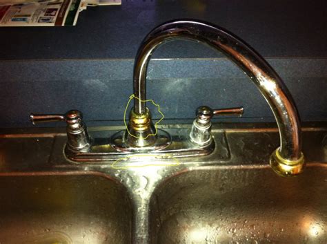 The packing nut on ceramic cartridge was loose. Moel kitchen faucet leaking at the base