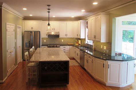Step to remodel your kitchen 1.set a budget : Kitchen remodel in Frederick with green painted walls ...