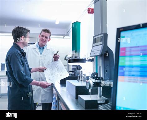 Two Engineers Blueprint Hi Res Stock Photography And Images Alamy