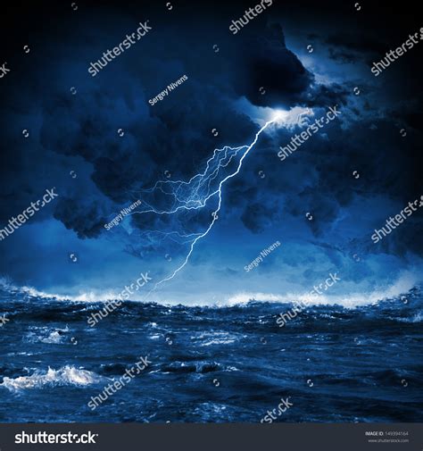Image Of Night Stormy Sea With Big Waves And Lightning Stock Photo