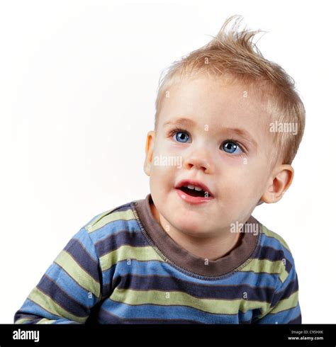 Studio Portrait Of A Happy One Year Old Baby Boy On White Stock Photo