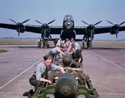 Bombs Being Loaded Onto A British Airforce Avro Lancaster Bomber During