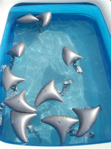 fun fin inflatables turn the swimmers into sharks summer pool party pool birthday party