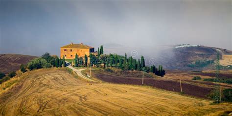 Crete Senesi Landscape In Tuscany Italy On A Foggy Dawn Stock Image