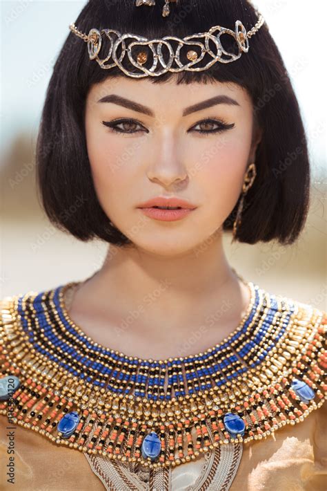 Beautiful Woman With Fashion Make Up And Hairstyle Like Egyptian Queen