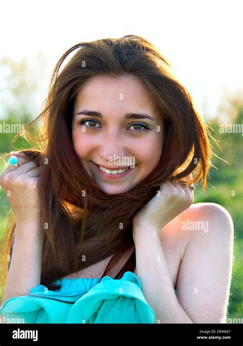 Portrait Of A Young Beautiful Girl Outdoors Spring Colors Stock Photo