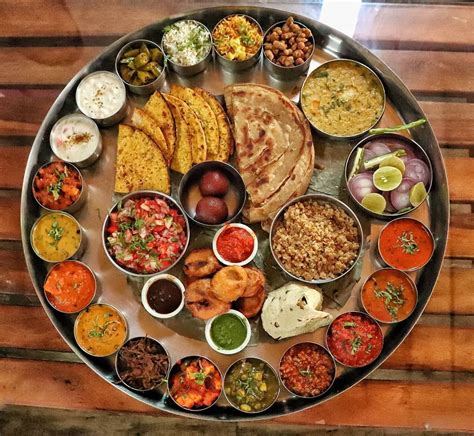 For pure vegetarians india is a heaven. This enormous thali includes more than 25 dishes apart ...