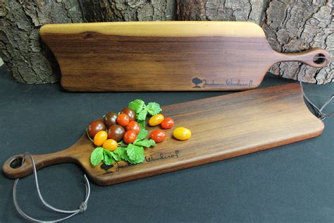 Our Paddle Cheese Board Made From South American Wamara Wood Wood