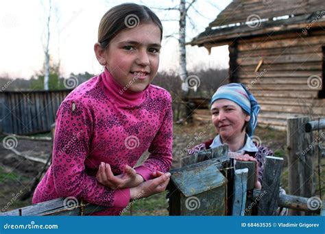 Portrait Of Russian Schoolgirl From Sparsely Populated Poor Village
