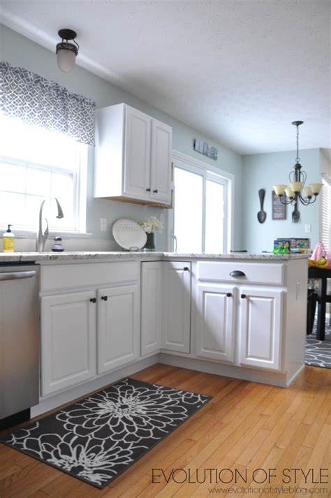 For the ceiling paint you can use the same color as the cabinets and trim, but in a flat sheen. A Super White Kitchen Makeover - Evolution of Style