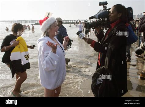 People Take Part In The Annual Coney Island Polar Bear Club New Year S