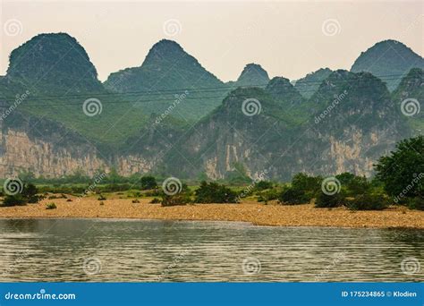 Karst Mountain Scenery Under Silver Sky Along Li River In Guilin China