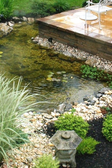 A quality koi pond can cost $5,000 to $100,000 or more. Easy DIY Koi Pond Projects You Can Build To Accent Your ...