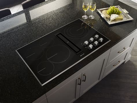 Offering precise temperature control and heating up more quickly than gas or electric cooktops, induction transfers heat directly to cookware. cooktops: Jenn Air Cooktops With Downdraft